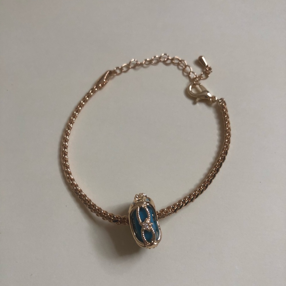 Bracelet with blue charm